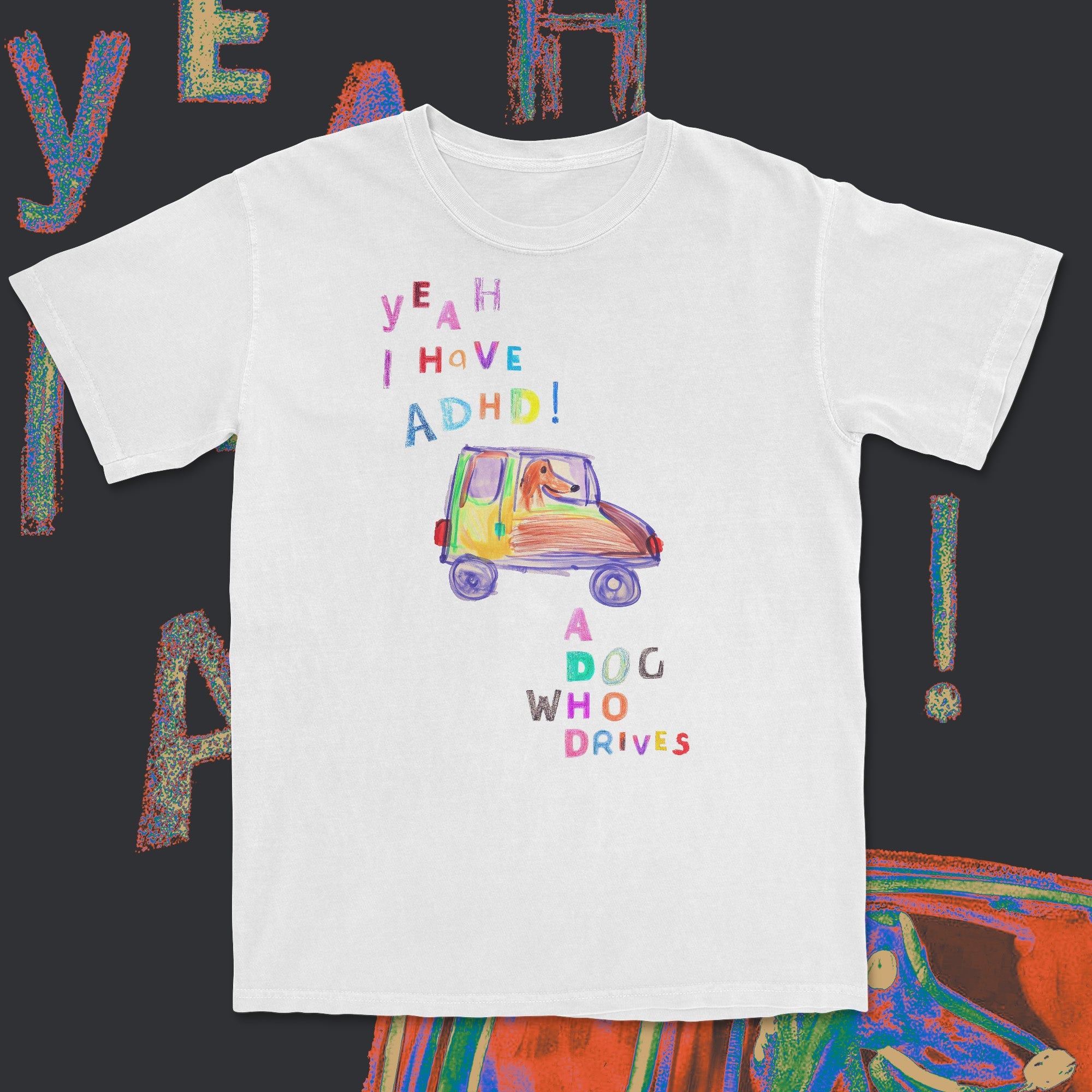 White t-shirt with colorful text and graphic of a car on a black background